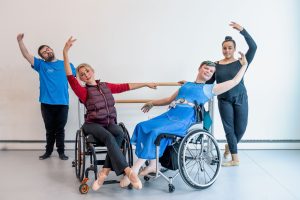 Suzie Birchwood in studio with dancers